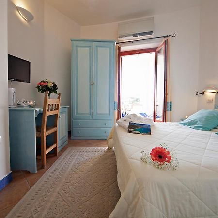 Bue Marino Hotel & Roof Lounge Кала Гононе Екстериор снимка
