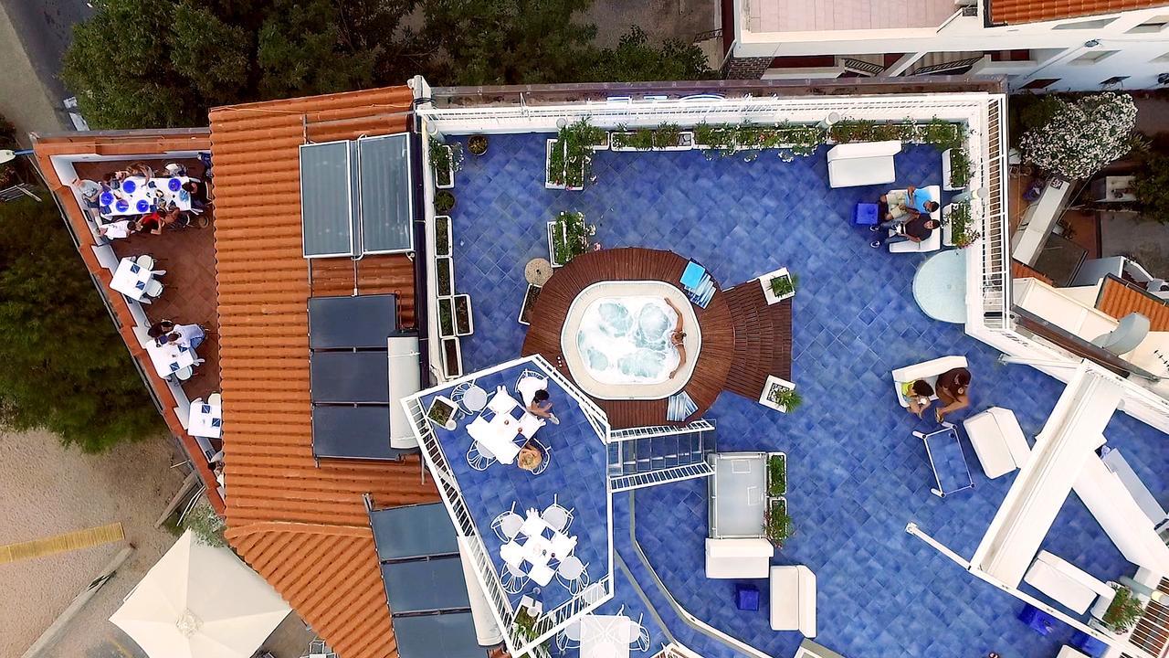 Bue Marino Hotel & Roof Lounge Кала Гононе Екстериор снимка