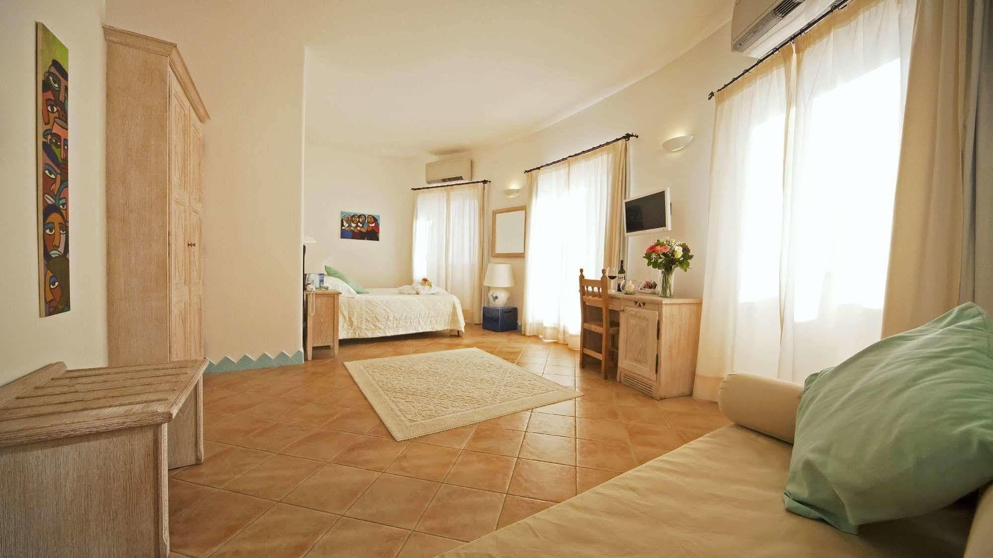 Bue Marino Hotel & Roof Lounge Кала Гононе Екстериор снимка